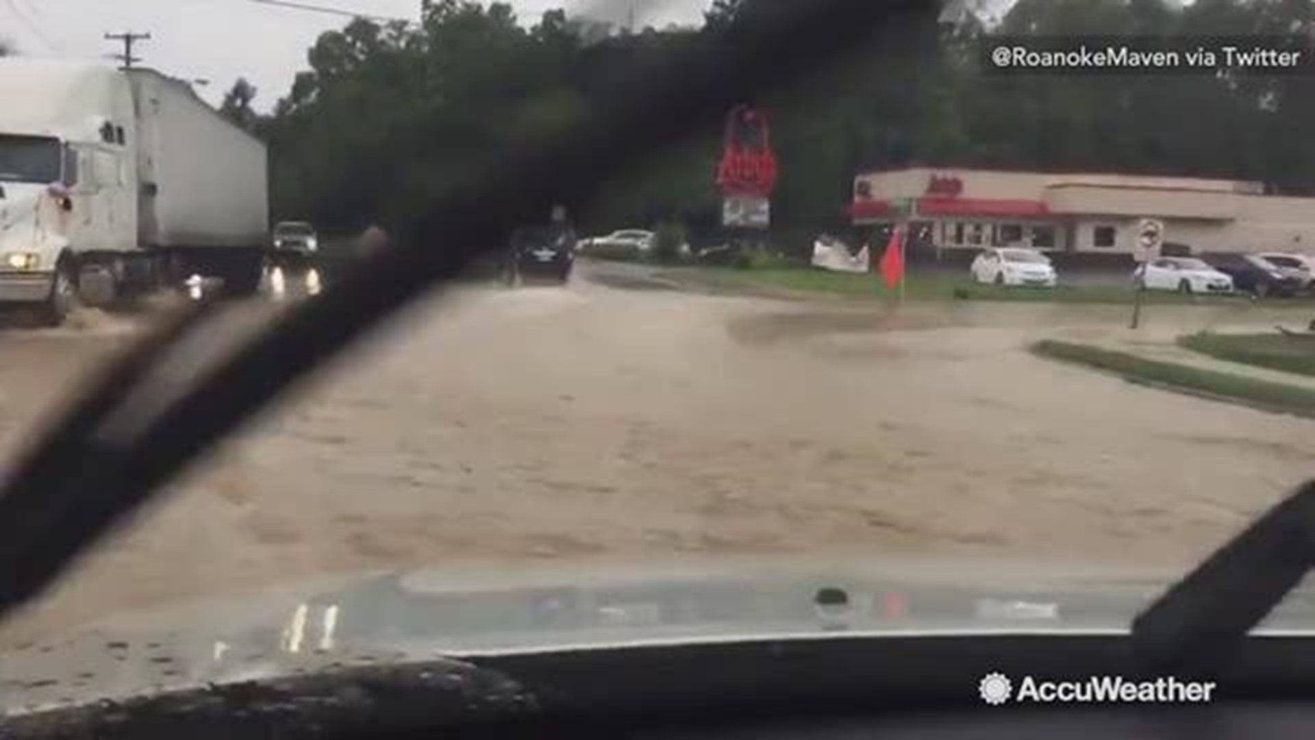 This is the scene at the intersection of Wildwood Rd and Main Street in Salem, VA. Christina Garnett, a Virginia resident, captured footage of high flood waters from Hurricane Michael as she made her way home.