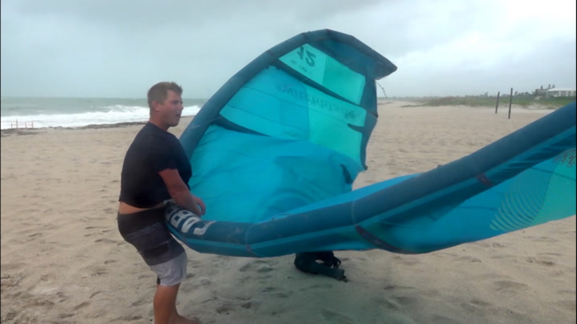 This kite-surfer in Vero Beach, Florida, challenged Isaias' winds on Aug. 2. The winds end up taking him for a wild and bumpy ride.