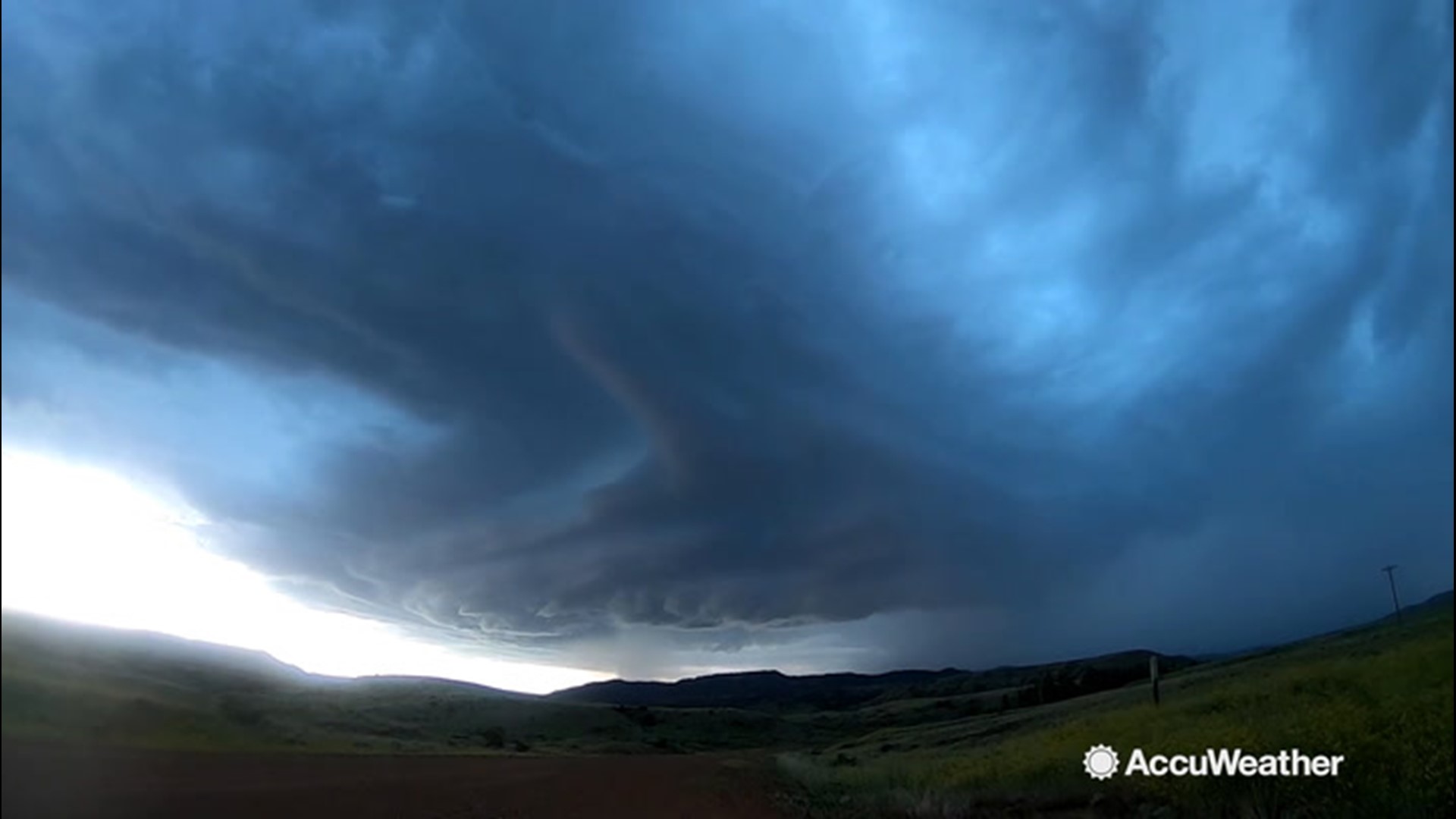 Extreme meteorologist Reed Timmer capture this picturesque triangle mothership supercell in Custer National Forest, Montana on June 26.