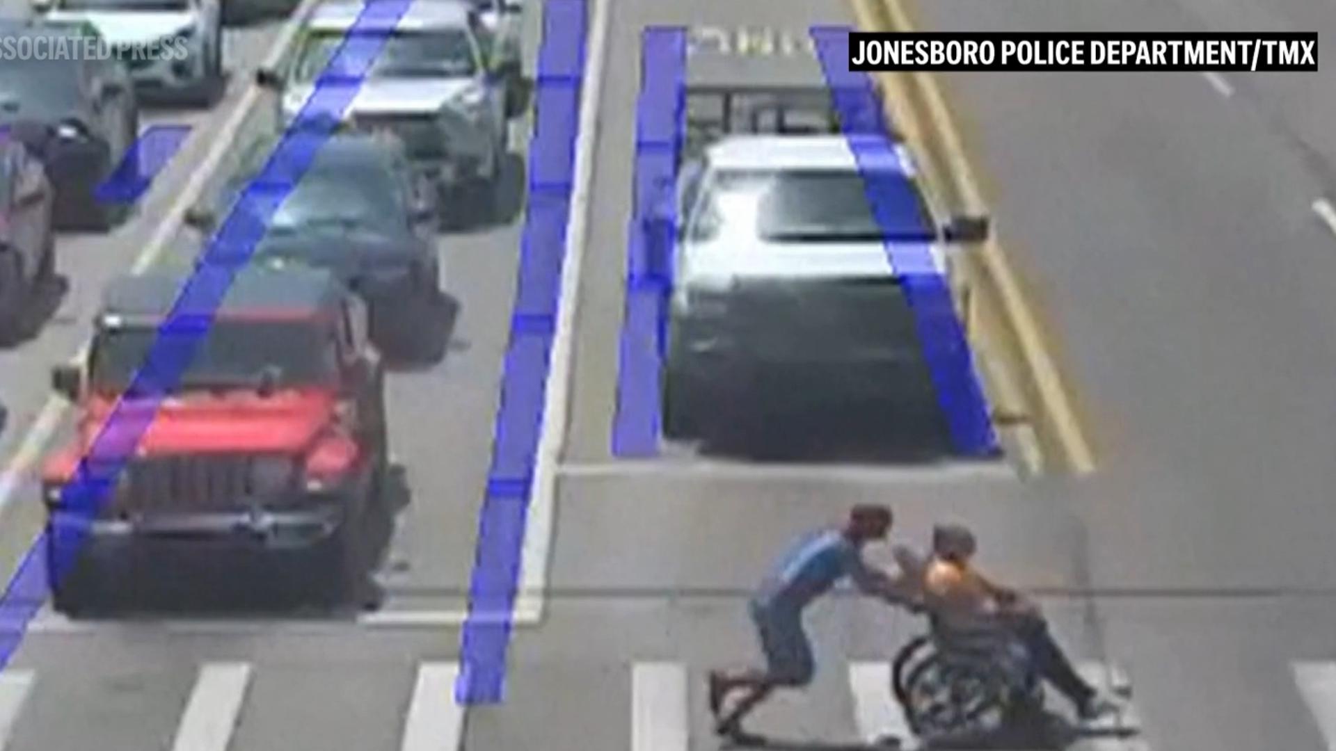 User Example 'Spider-Man' jumps to the aid of a man using wheelchair to cross ...