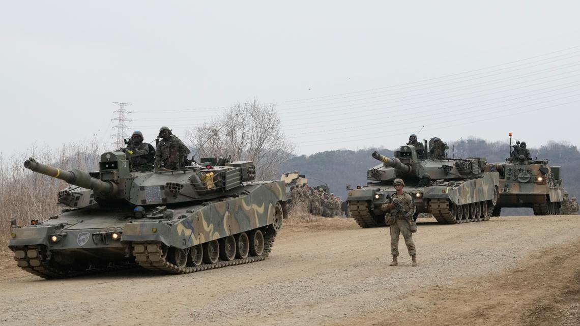 North Korea fires about 10 missiles toward sea in show of force, South ...