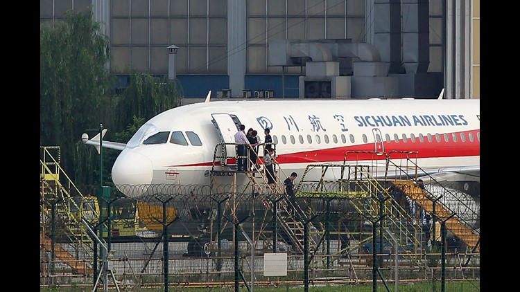 sichuan pilot makes emergency landing after co-pil