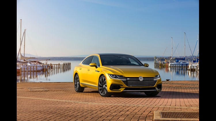 vw delivers new suv and arteon four-door coupe one key vehicle