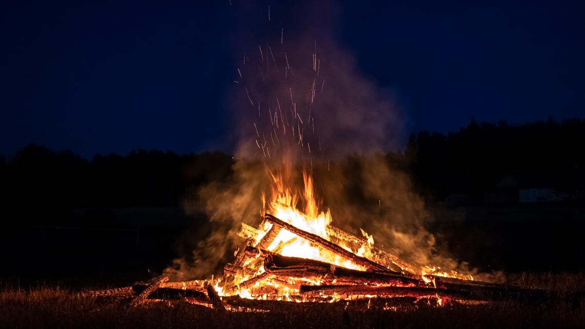 Guilford County issues an emergency burn ban until Wednesday at midnight due to unhealthy air quality from ozone pollution, impacting multiple nearby counties.