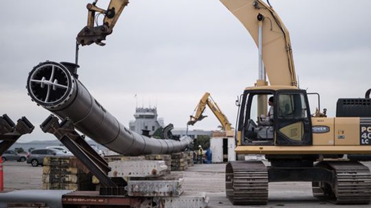 a giant floating trash collector will try to scoop up the great