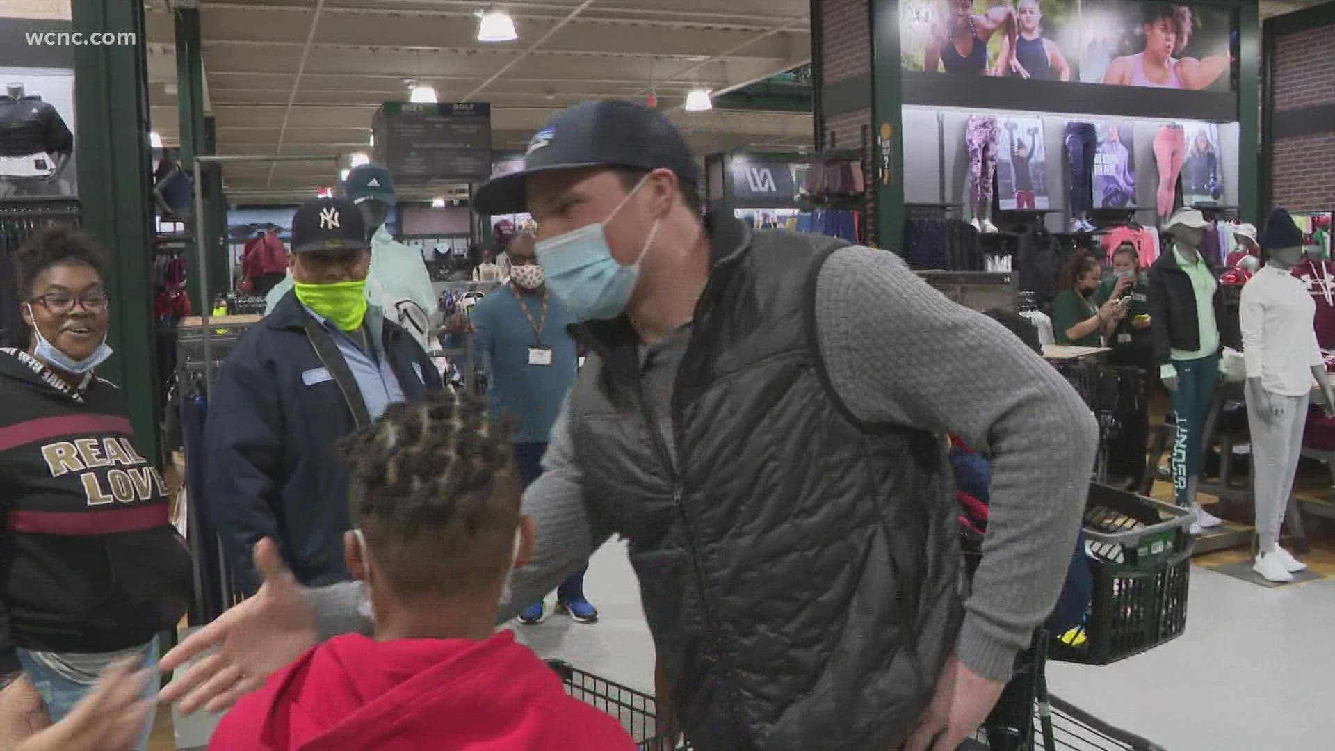 Luke Kuechly was joined by 15 children from the Charlotte area for a surprise holiday shopping event inside DICK'S Sporting Goods in Pineville.