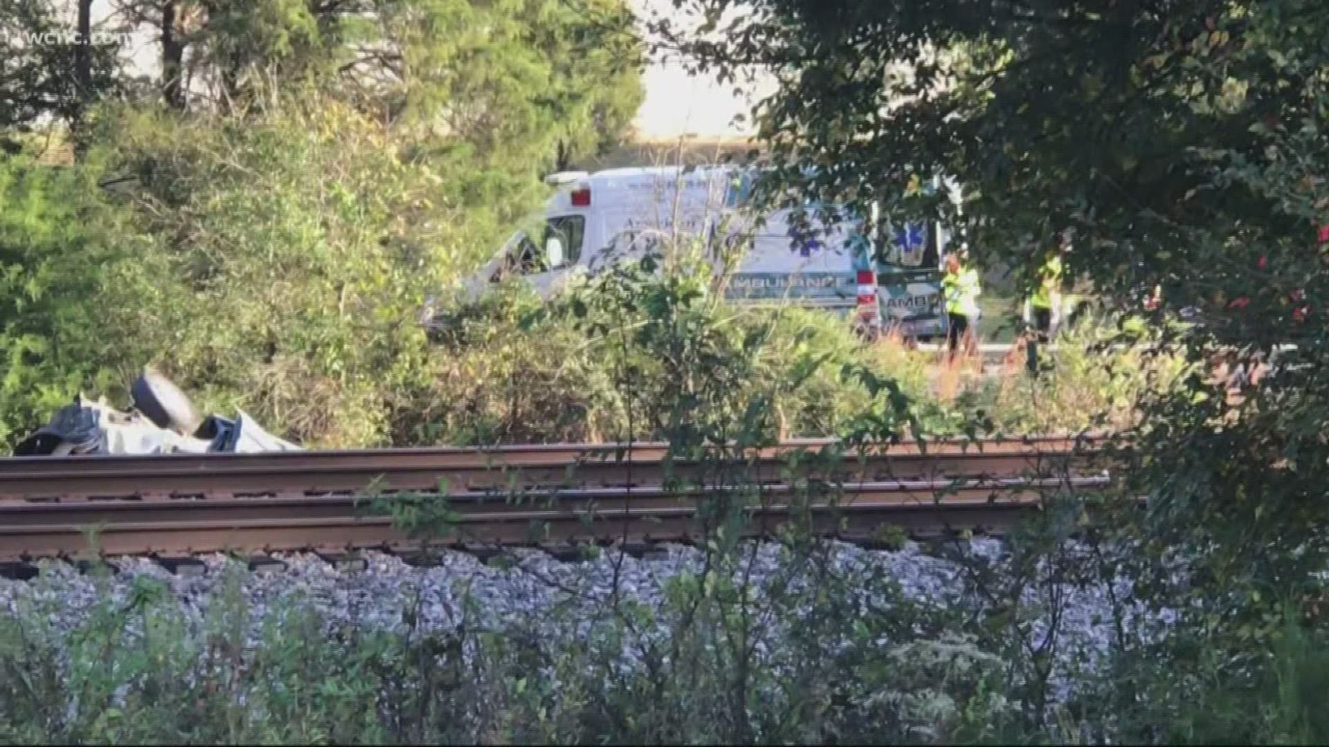 None of the passengers on the train were injured, officials said. The two killed were in the passenger vehicle, which overturned and was pushed down the tracks.