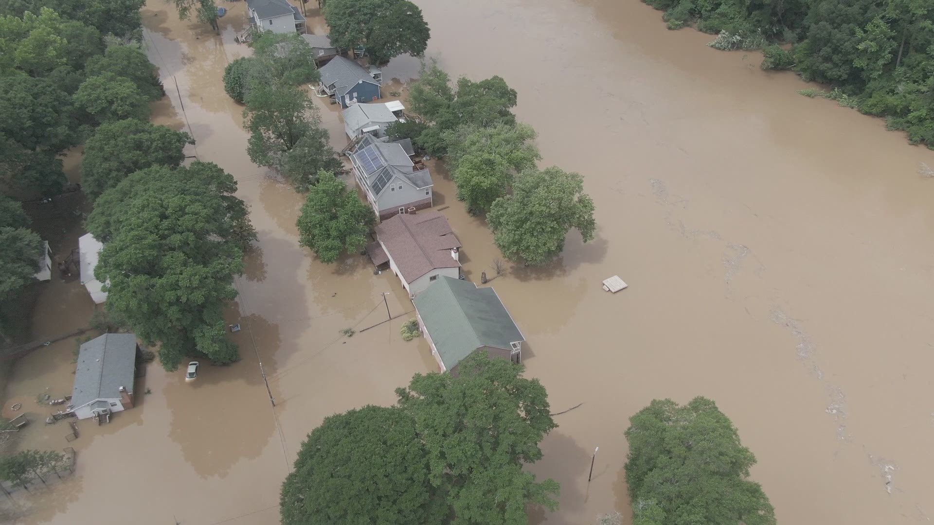 Footage captured around Riverside Drive, near the Catawba River, shows flooding in Harwood Lane. Several houses are visibly impacted by the waters.