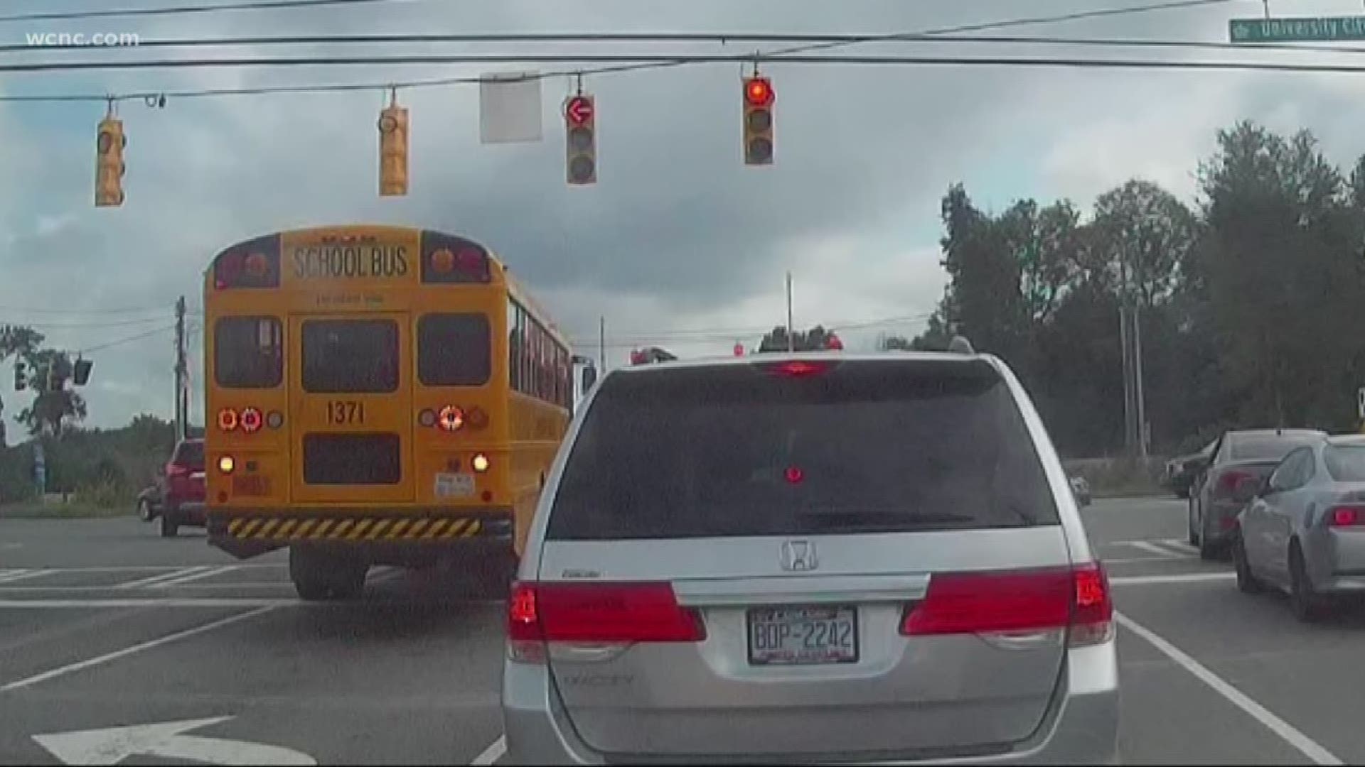 In Robert and Joann Waite's video, you can see North Carolina Public Schools Bus 1371 speeding toward a yellow light and crossing the intersection after the light turned red.