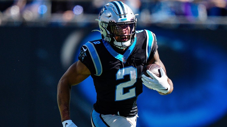 Panthers trade multiple picks, DJ Moore to Chicago for No. 1 pick