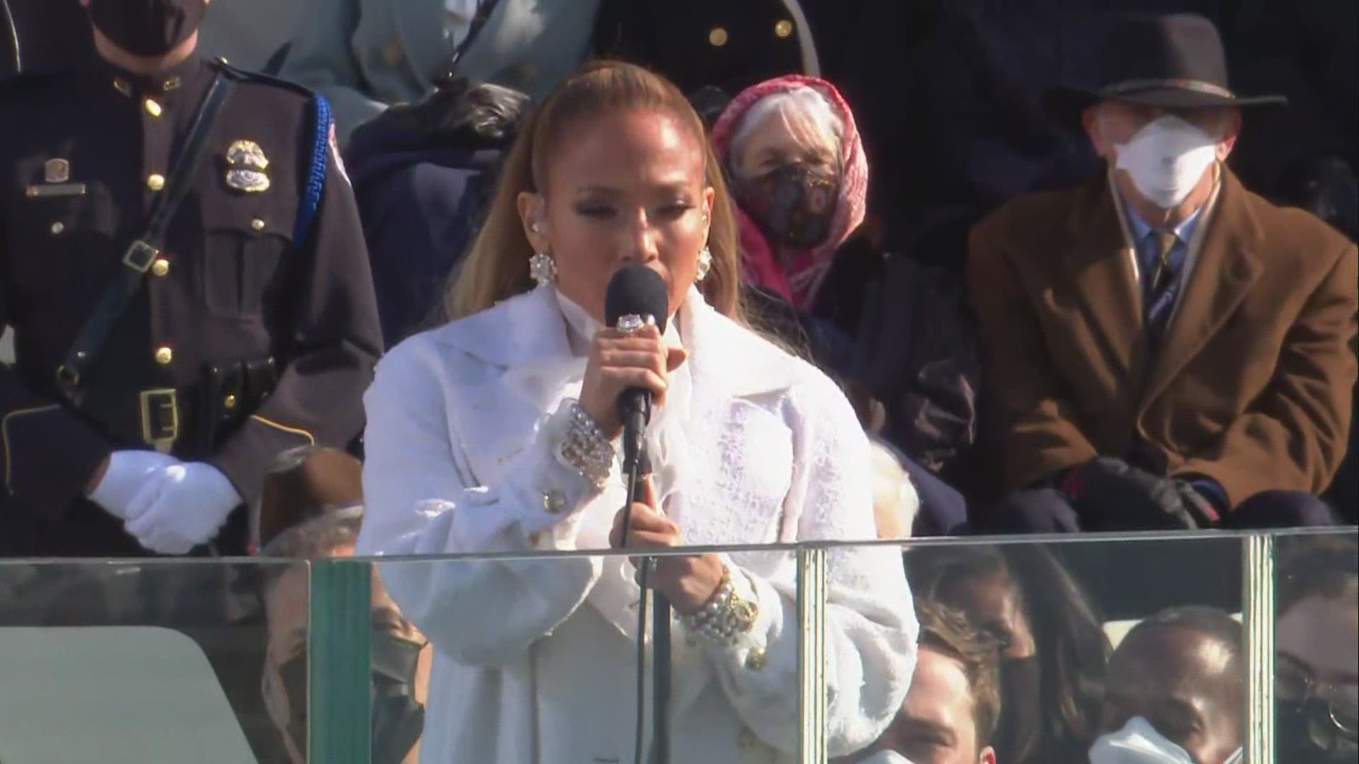 Jennifer Lopez sings a mashup of 'This Land is Your Land' and 'America the Beautiful' at inauguration.