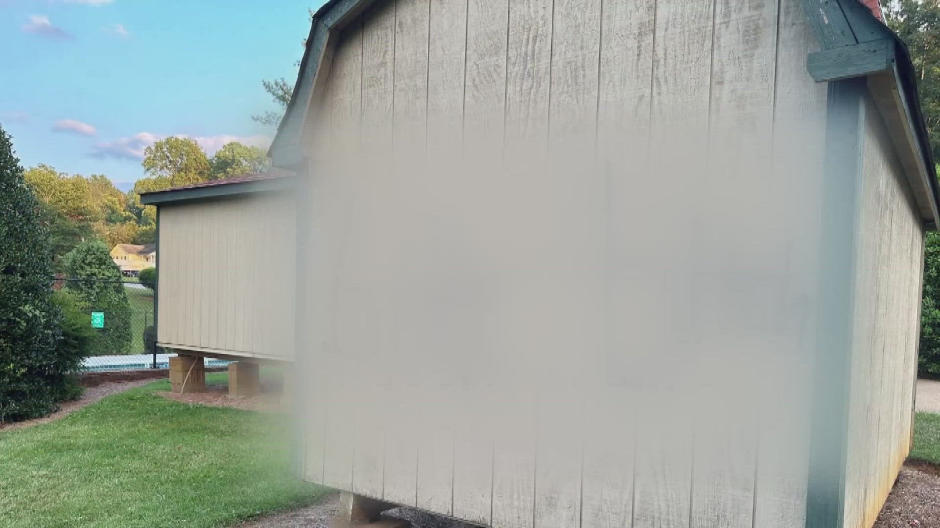 Kim Jennings said someone sprayed graffiti on a shed at the apartment, days after the video went viral.