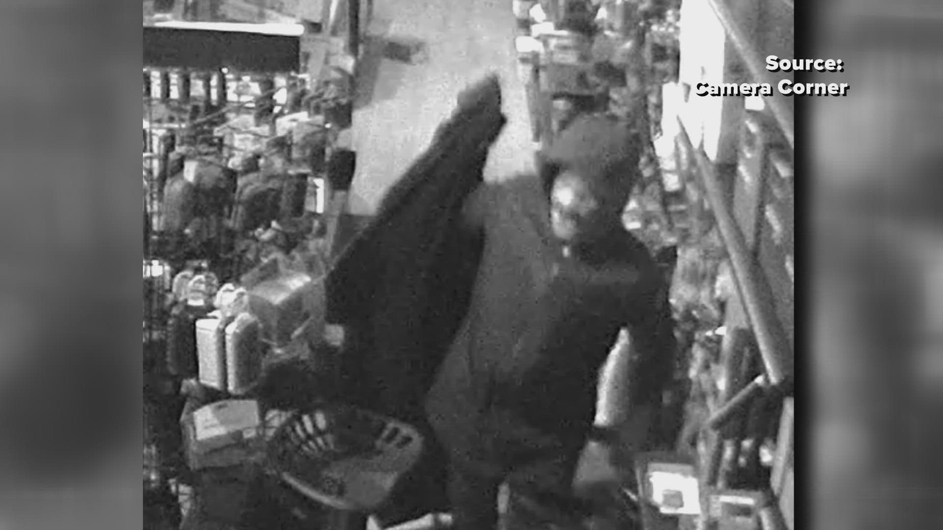 Surveillance video captured the suspects taking items from the store just days after Christmas.