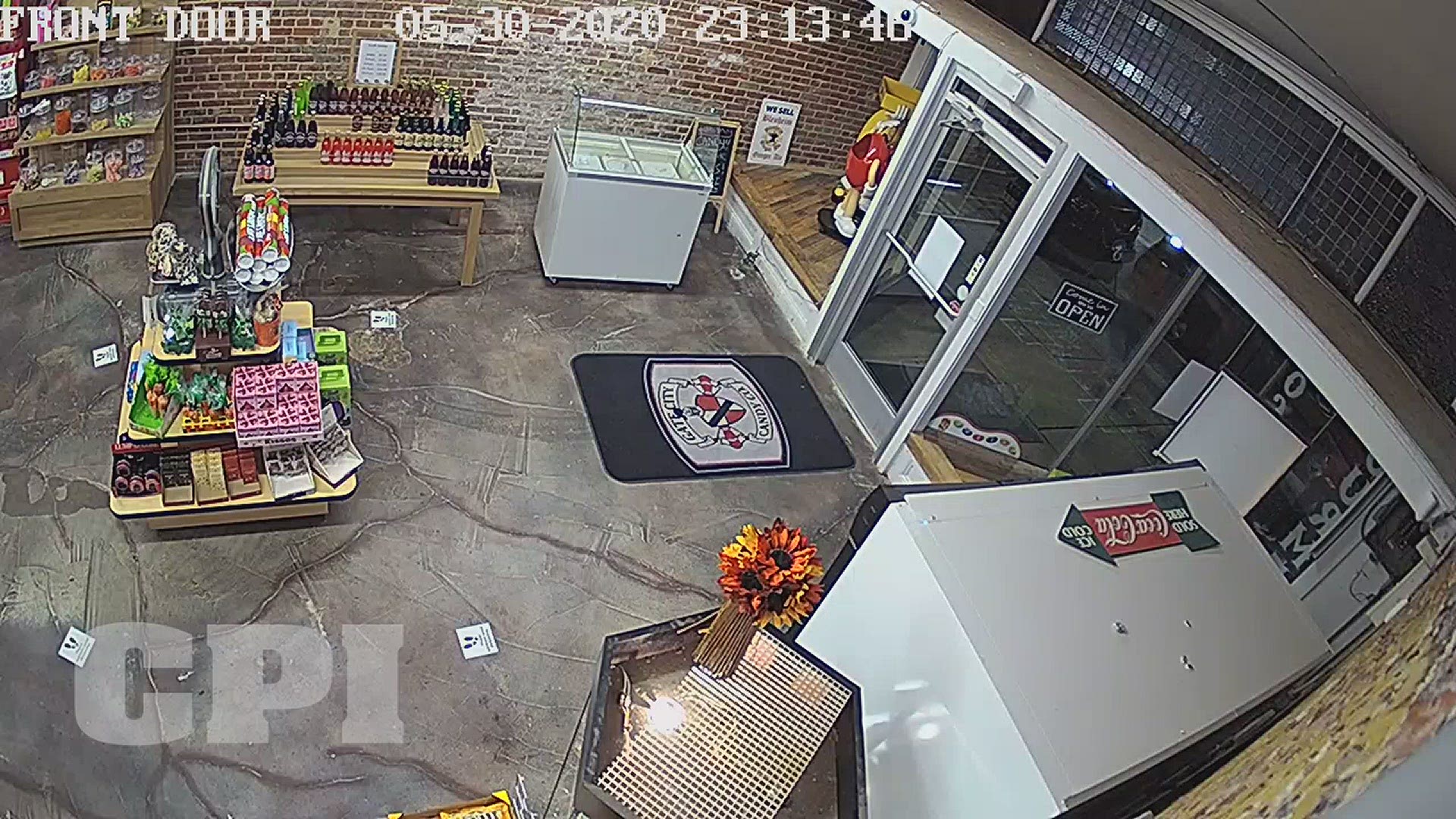In the video you can see a suspect smashing the windows of Gate City Candy Company with a stool Saturday night.