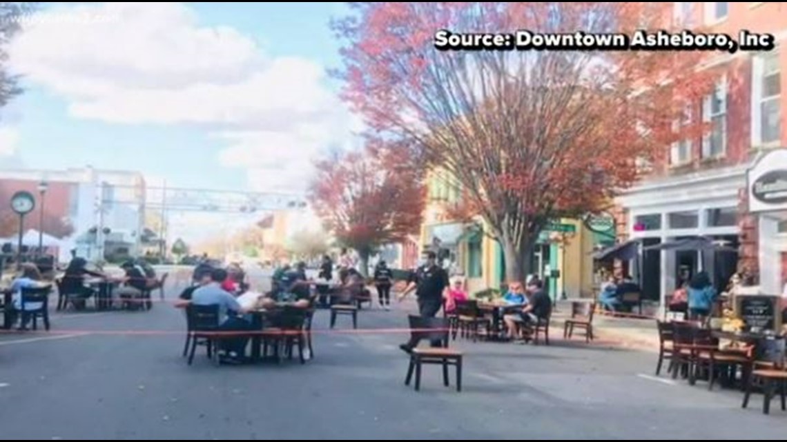 A street festival features a string of restaurants in Asheboro