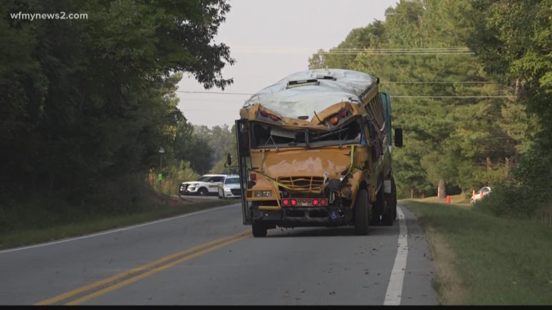 Highway Patrol said the truck driver crossed the center line and hit the bus. After the collision, the Rockingham County bus flipped down and embankment.