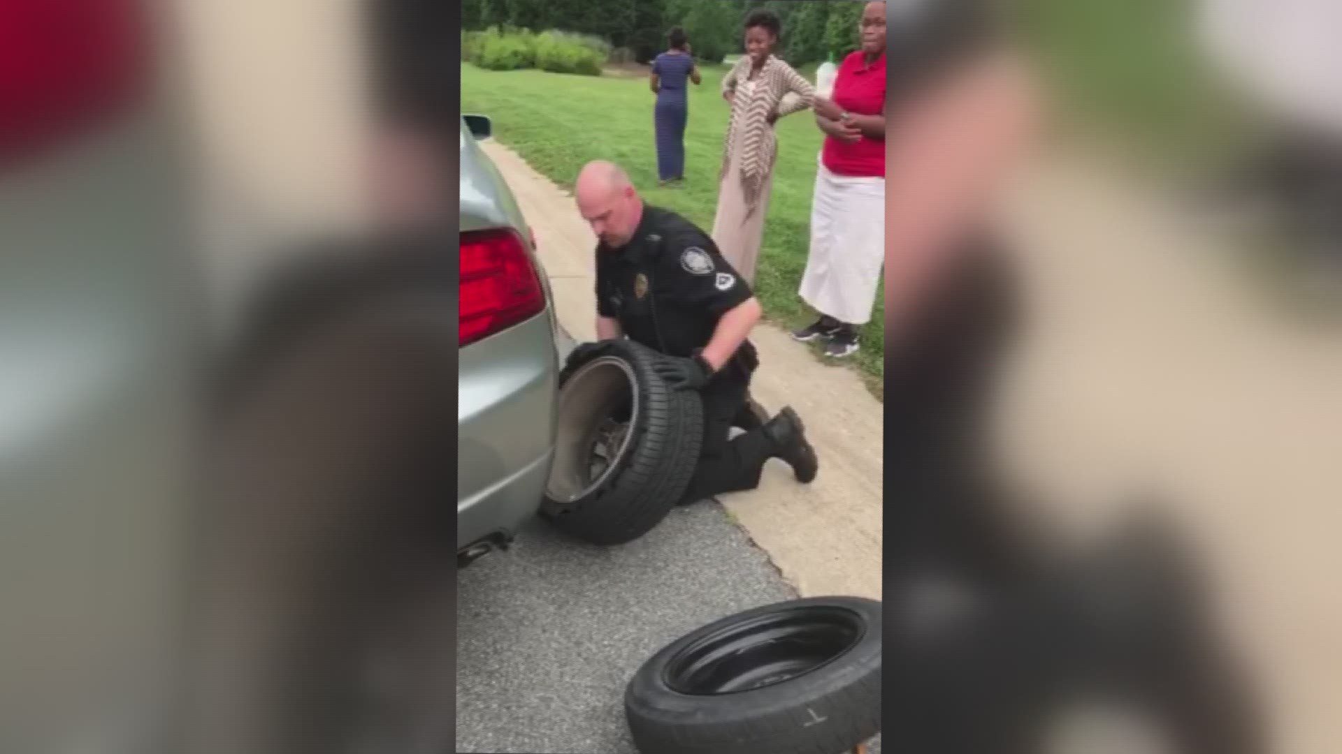 Greensboro Officer Helps Women Change Tire