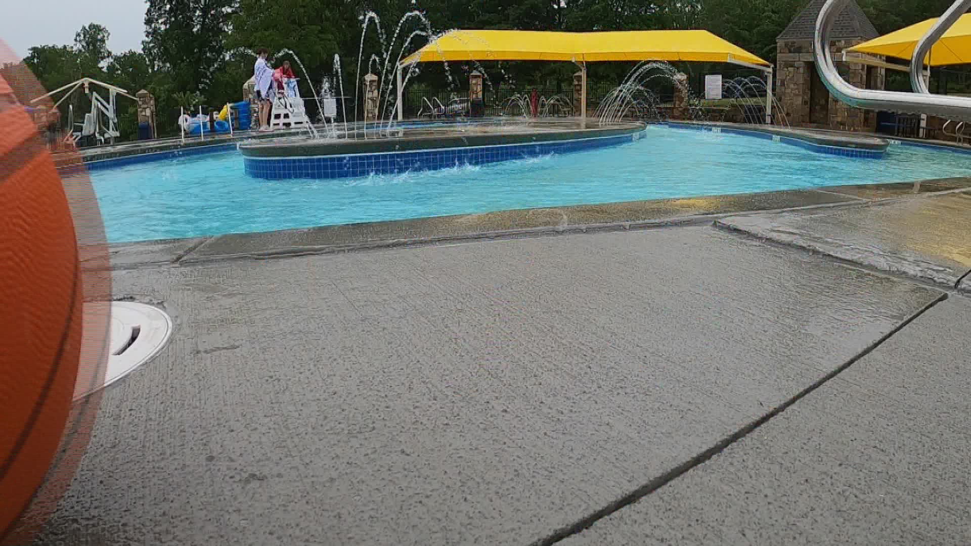 Pools would typically be busy on Memorial Day weekend but are all but deserted thanks to the cold, rainy weather.