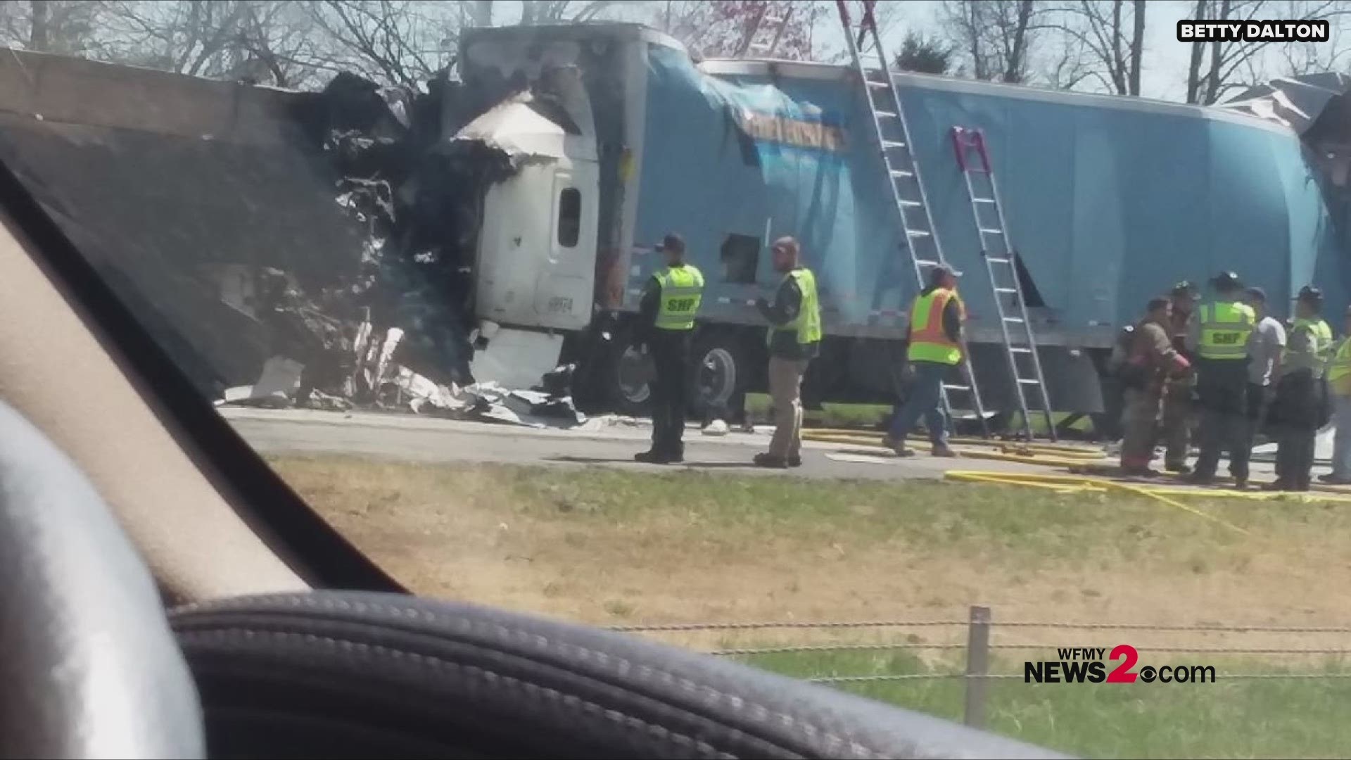 Two people have died following a crash on I-77 in Yadkin County involving three tractor-trailer trucks and a pickup truck.