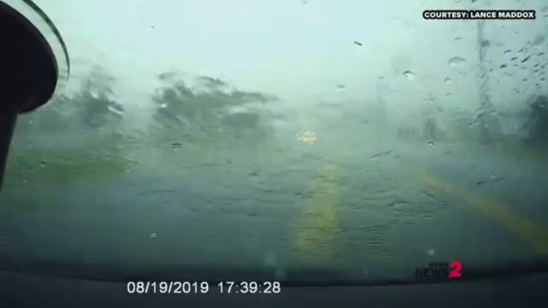 A Triad driver tried to seek shelter from the storm as hail cam pounding down on his vehicle!
