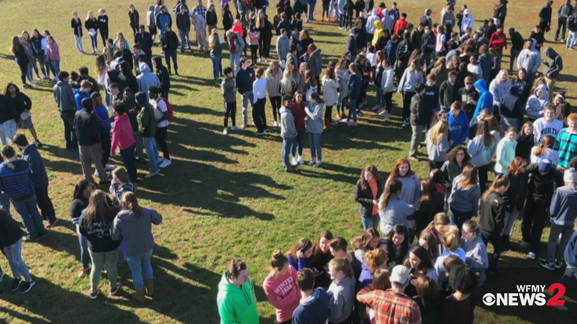Students at Western Alamance High School walk out to join a national movement protesting gun violence at schools.