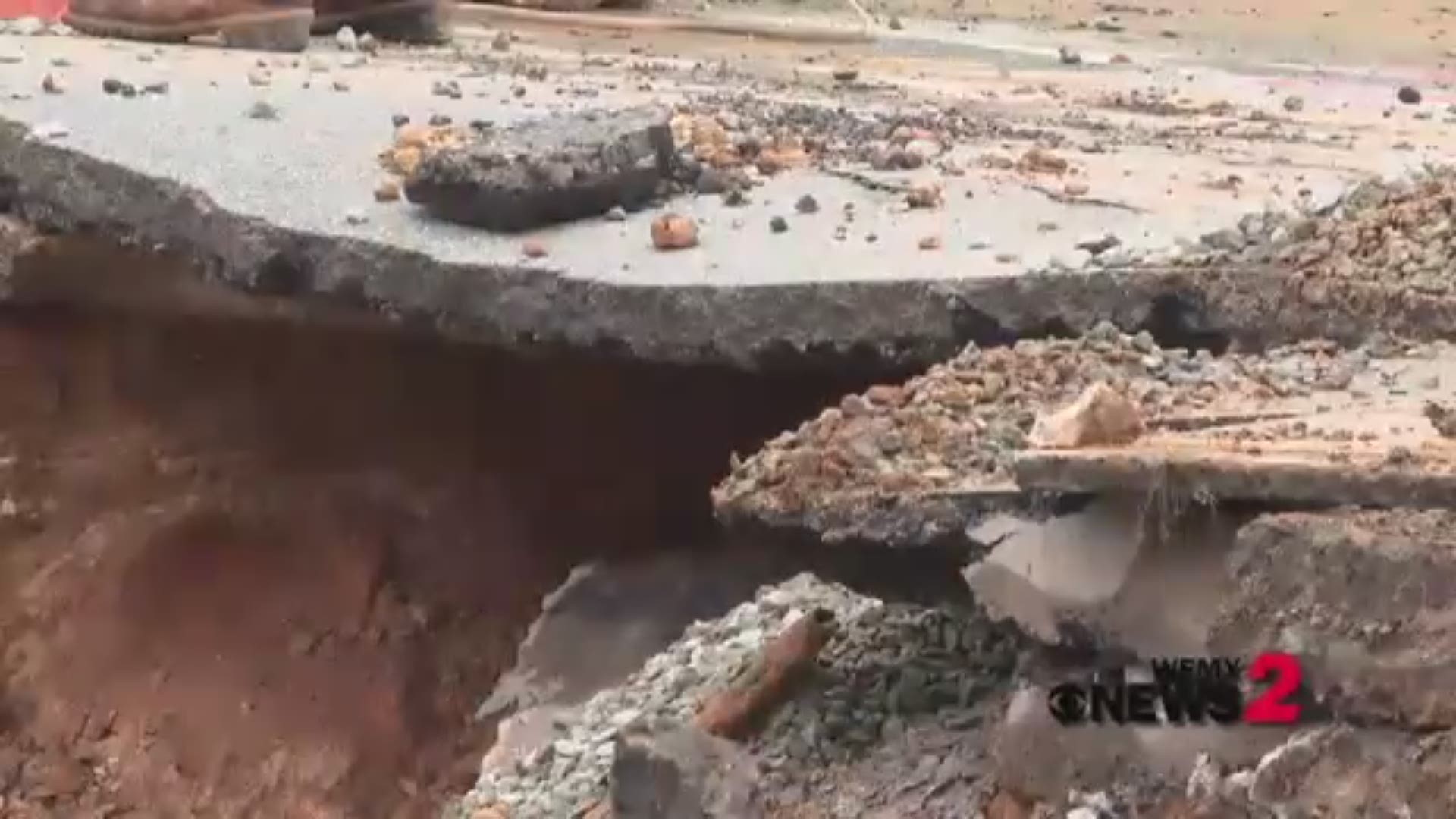 Winston-Salem road crews work to repair a sinkhole on Waughtown Street. There’s no word yet on what caused the sinkhole to form.