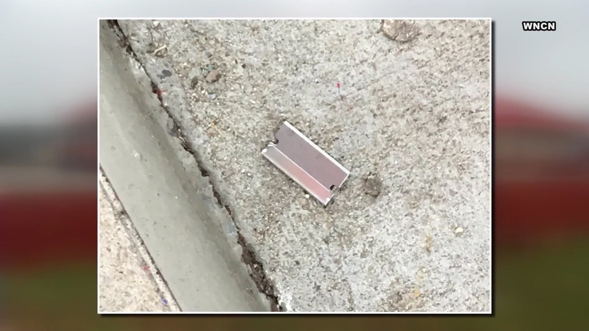 A Siler City man says he found a razor blade in the rubber grip of a gas pump on Friday.