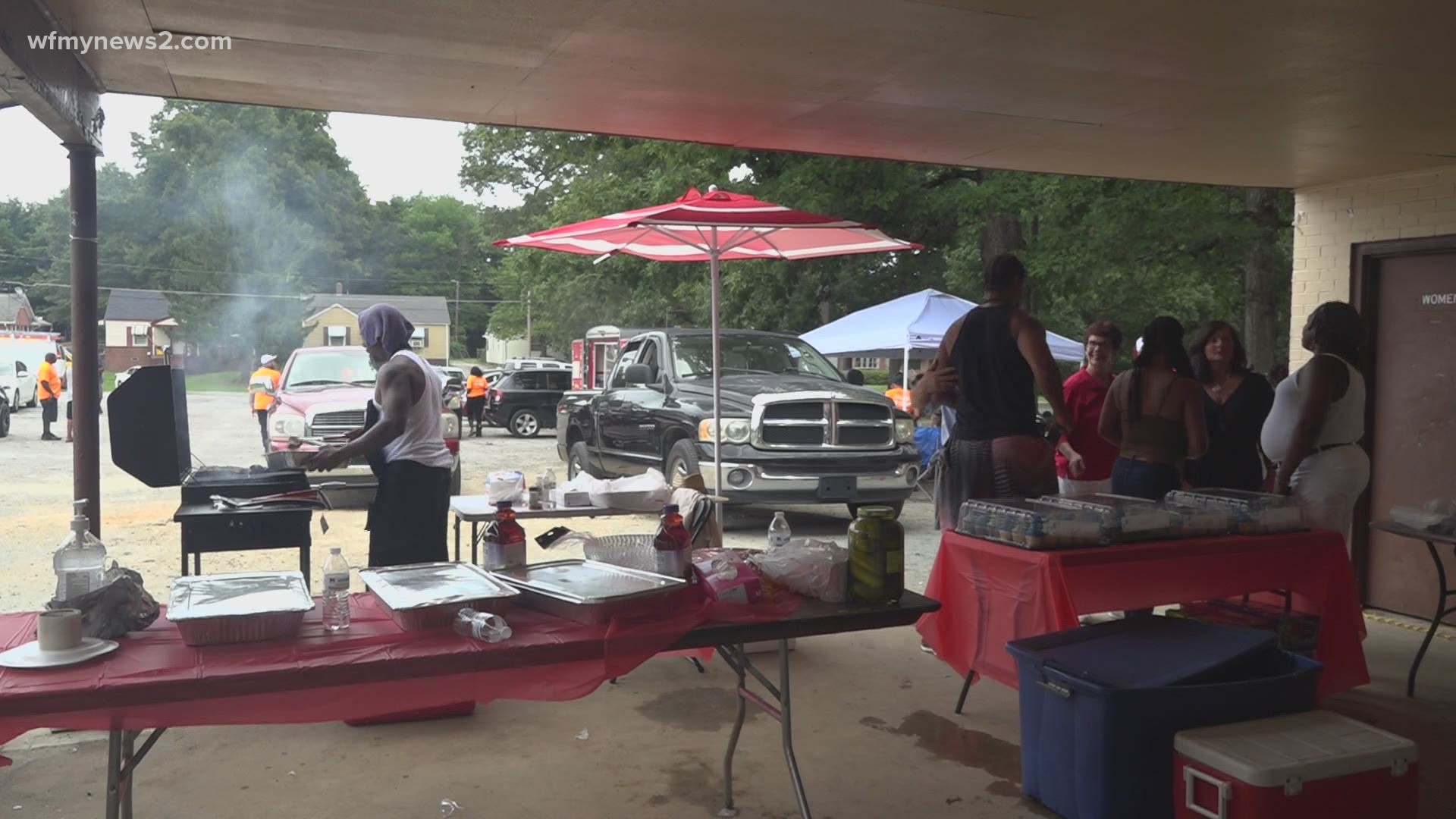 A crowd gathered at a park on Duke Street, organized by the family of two cousins who were killed during a home invasion in 2019. The murder is still unsolved.