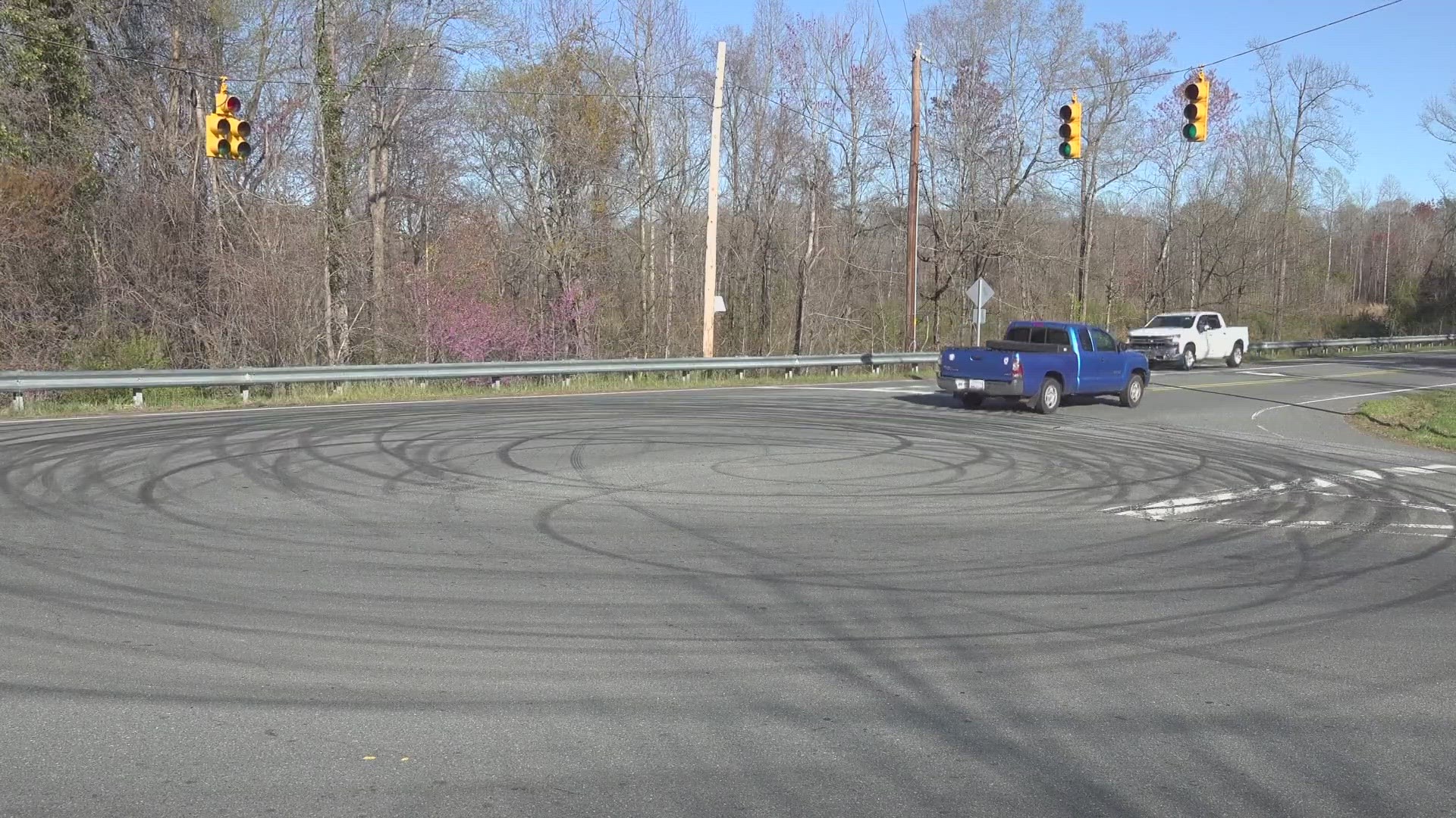 Tire marks cover the street on Presbyterian Road. Guilford County deputies confirm they responded to break up a car meet.