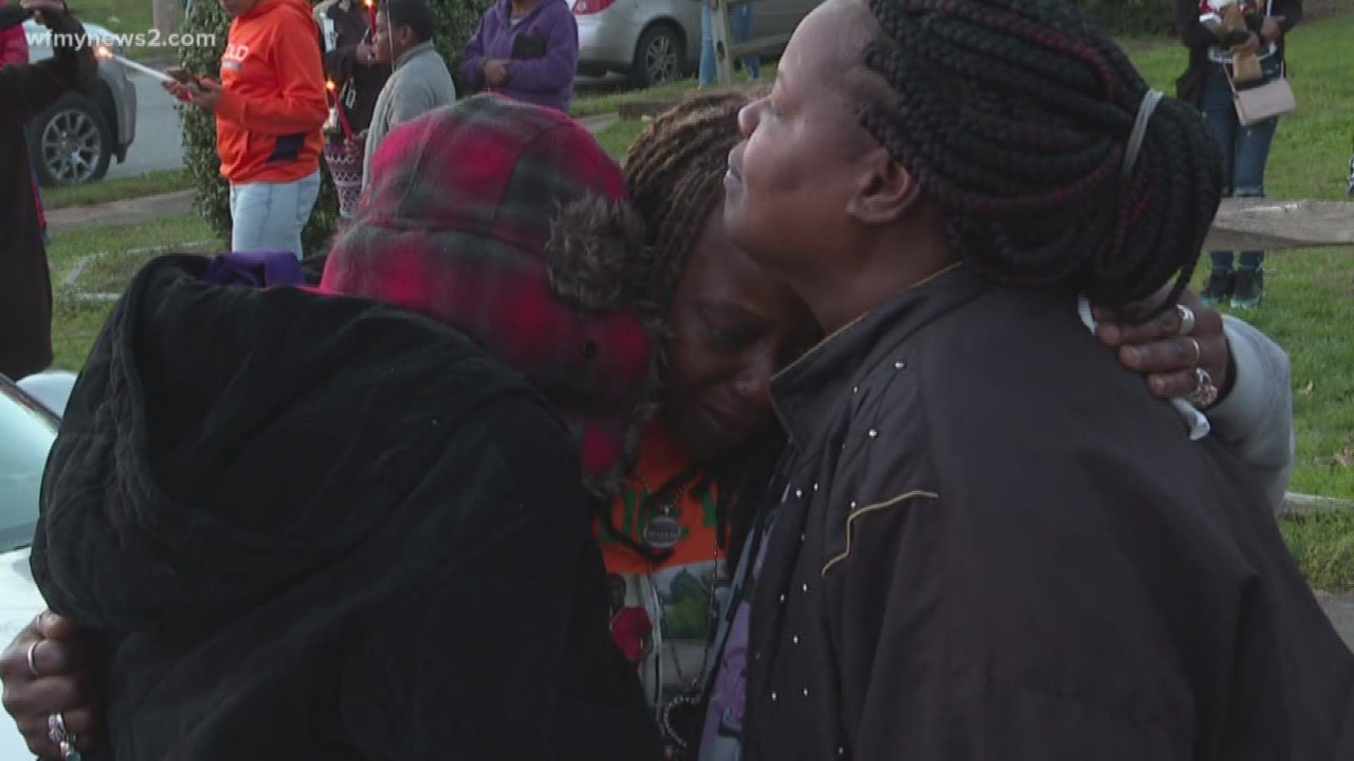 At a candlelight vigil Tuesday, distraught family and friends honored 18-year-old James Murray Jr.