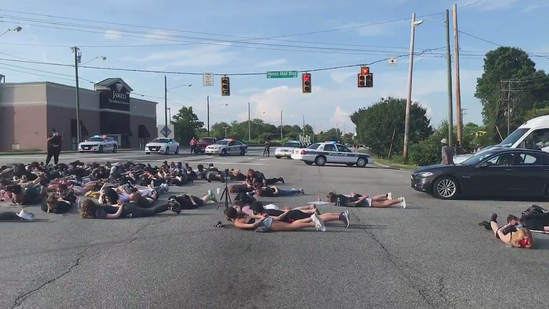 Black Lives Matter protest shuts down a busy intersection in Winston-Salem. Protesters also gathered in the Hanes Mall area.