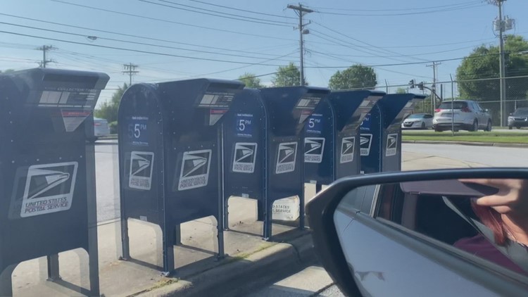 The USPS reinstalled blue mailboxes to allow for drive-thru mail drop-off in Greensboro