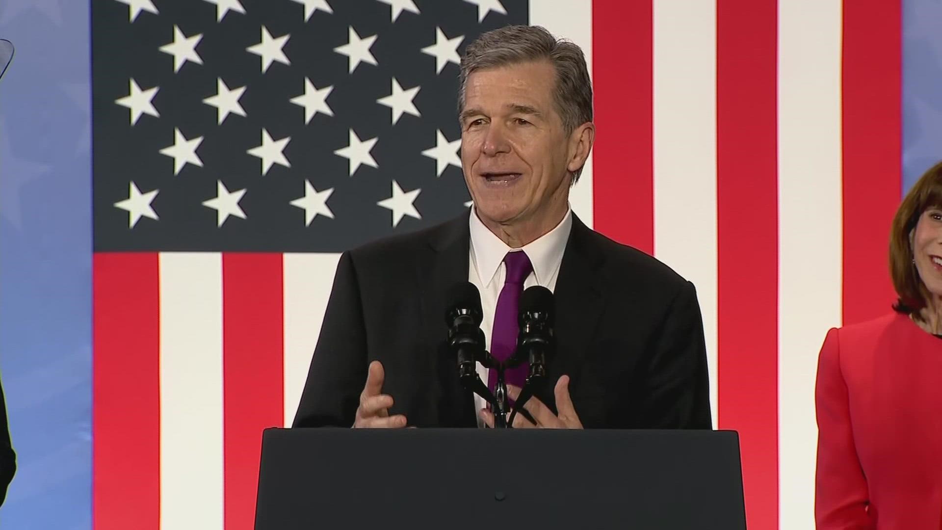 Governor Roy Cooper gives his very best "Aggie pride," ahead of President Biden's speech.