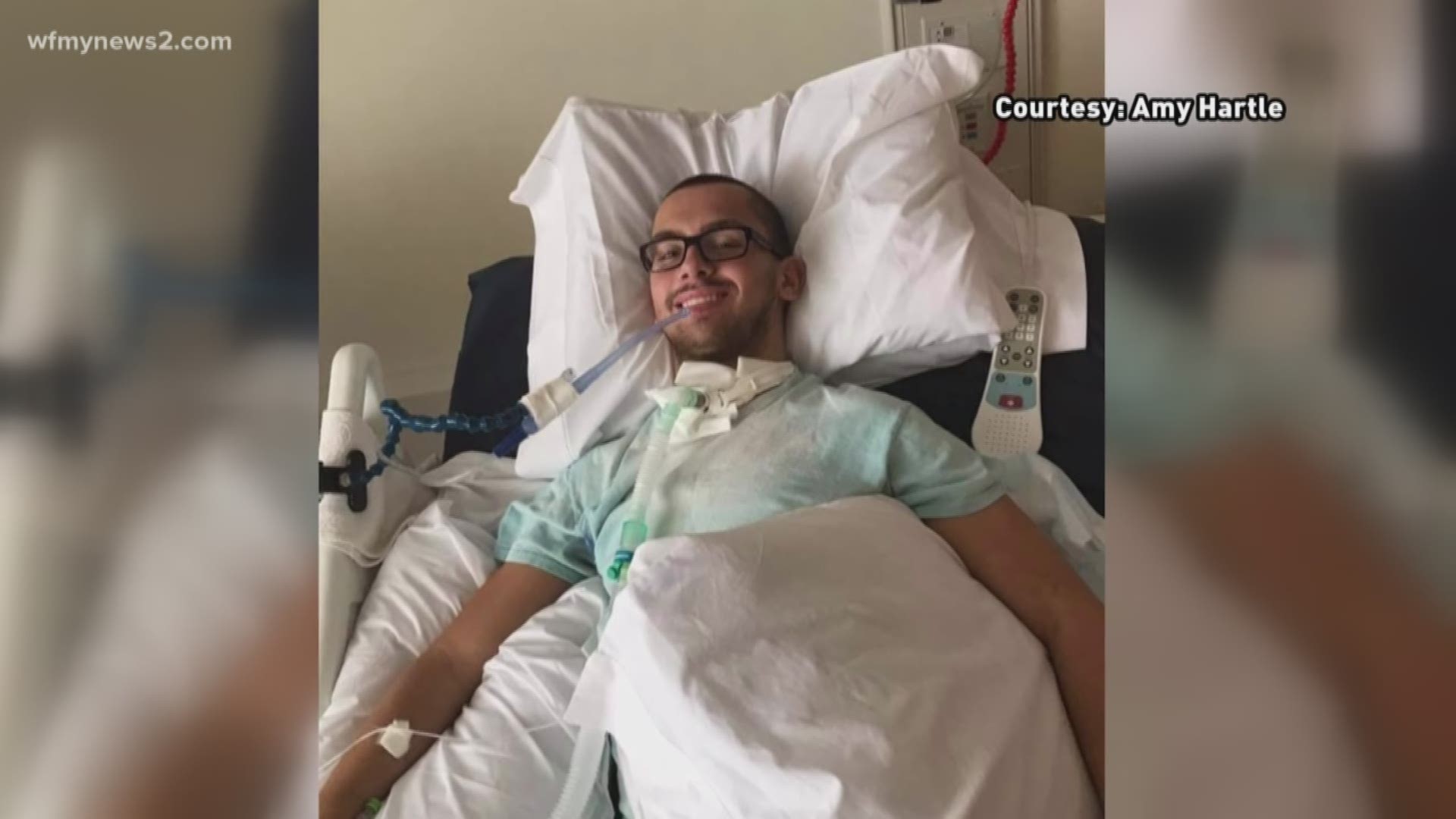 Andrew Hartle lost movement from his waist down after diving into the ocean. Now he’s rehabbing, working on his strength, and leaning on his family for support.