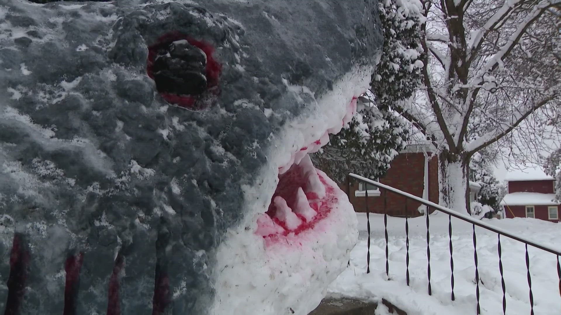 Family turns snow into a JAWS replica.