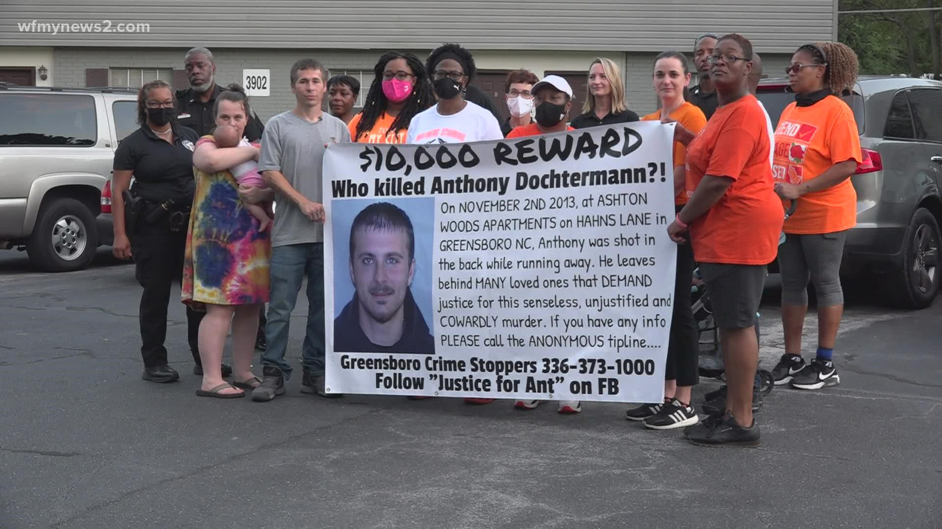 Nearly eight years after a man was shot and killed in Greensboro, volunteers hit the streets to help find new leads to find the killer.