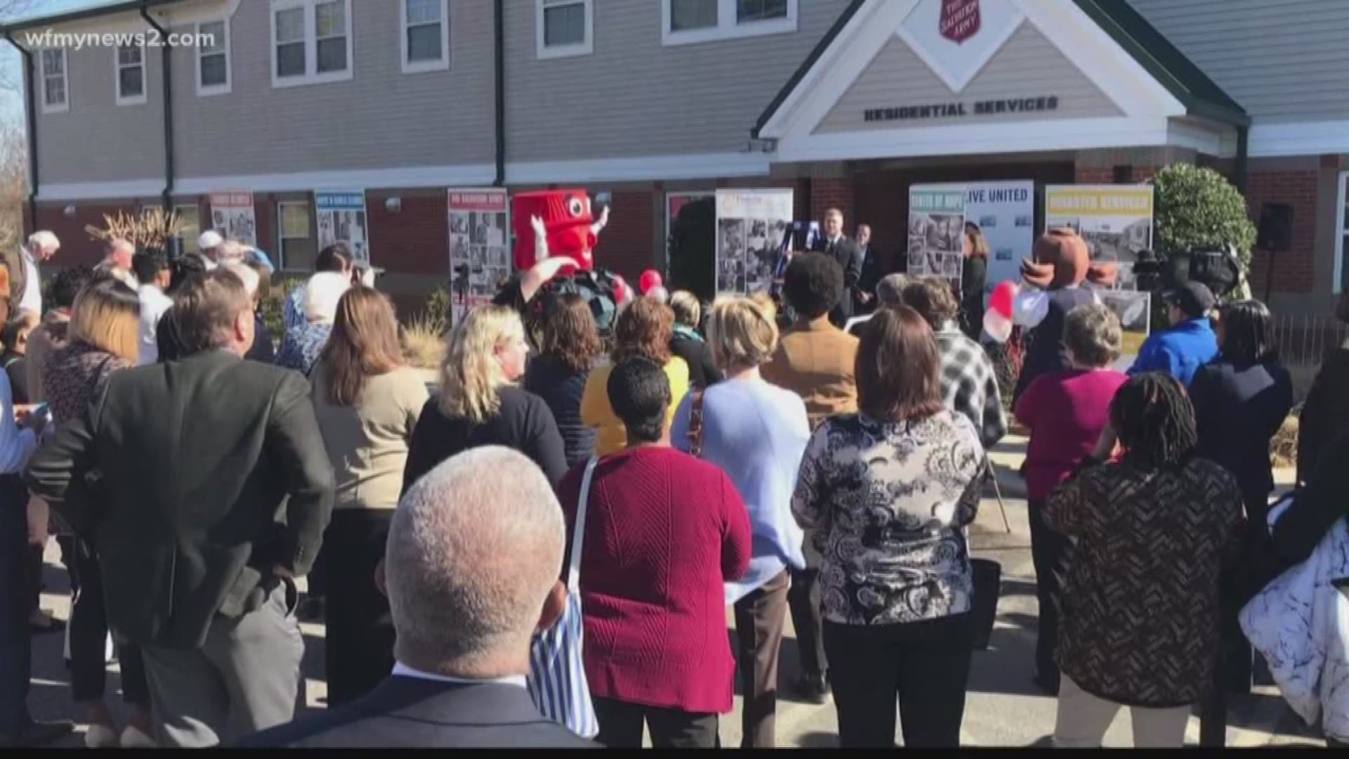 Mayor nancy vaughan and other greensboro leaders cut the ribbon today at the salvation army's center of hope location