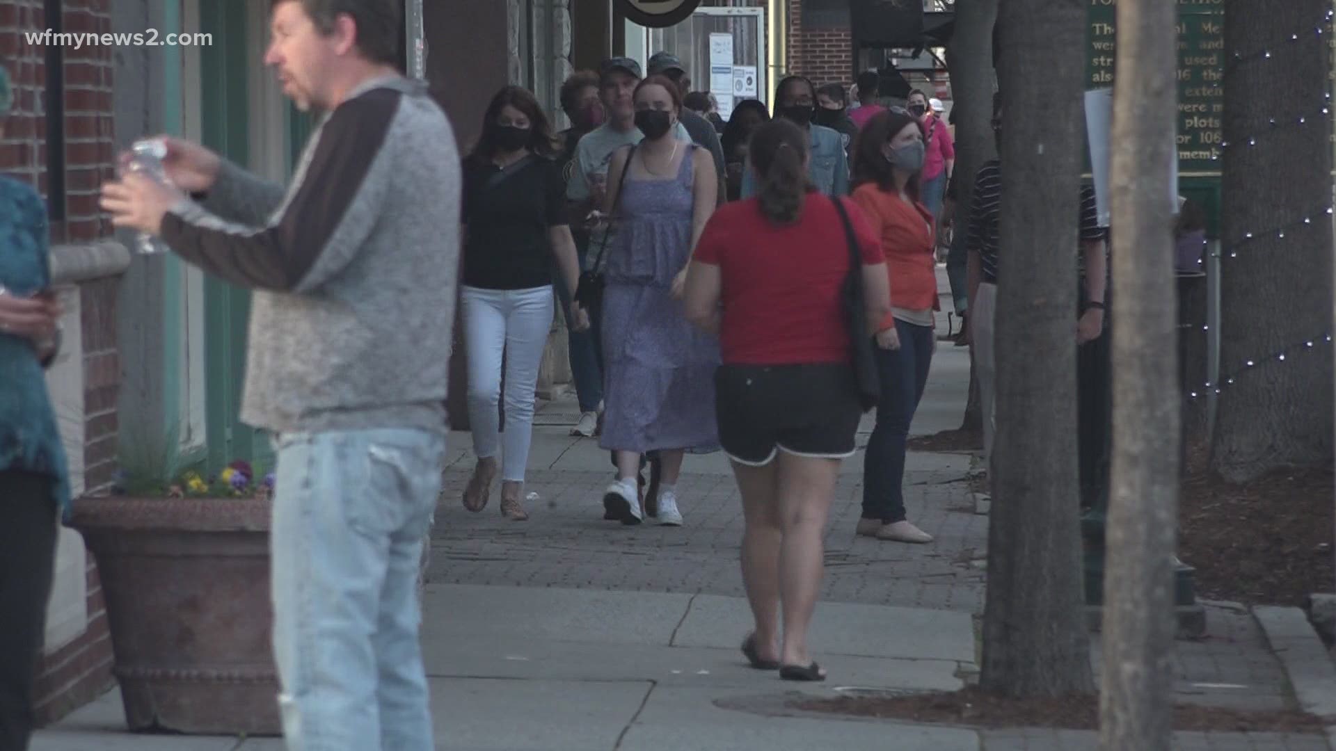 Gov. Roy Cooper says starting Friday, masks will no longer be required outside and mass gathering limits will increase to 100 people indoors and 200 people outdoor