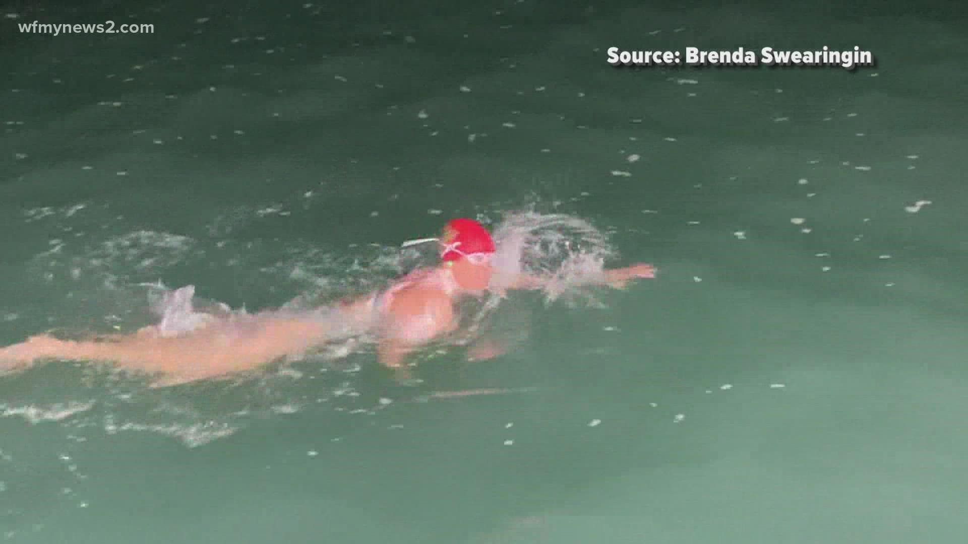 The 51-year-old made the 21 mile swim in just over 13 hours.