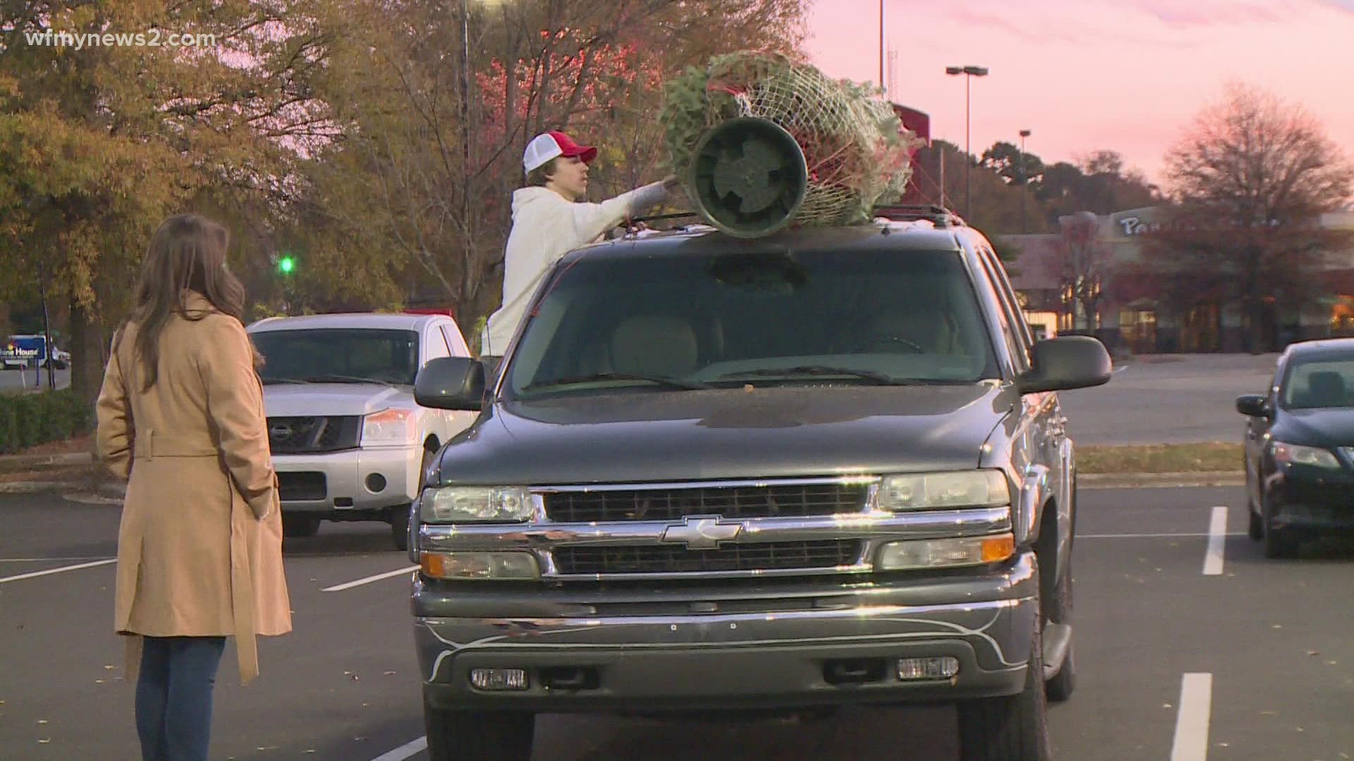 Some families came out early to the Christmas tree lot on Lawndale Drive in Greensboro.