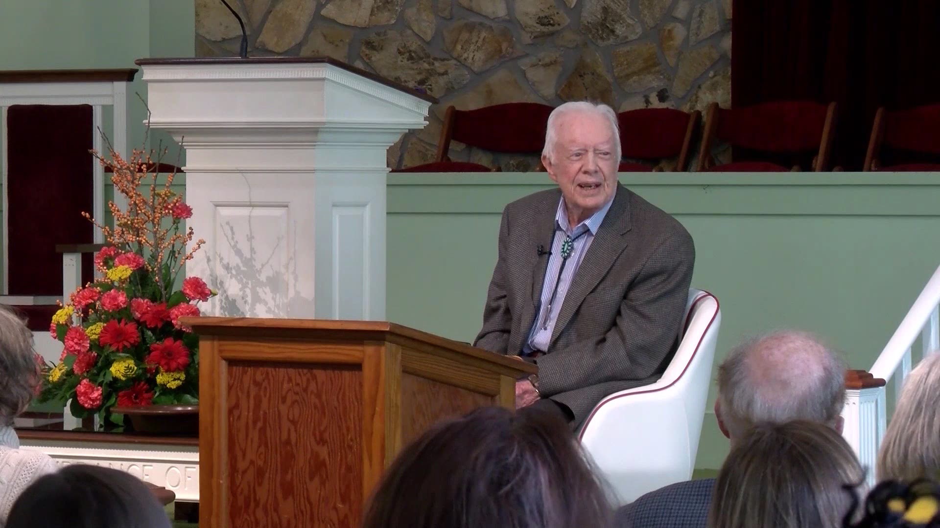 Former President Jimmy Carter taught a Bible lesson on life after death Sunday less than two weeks after breaking his pelvis in a fall.