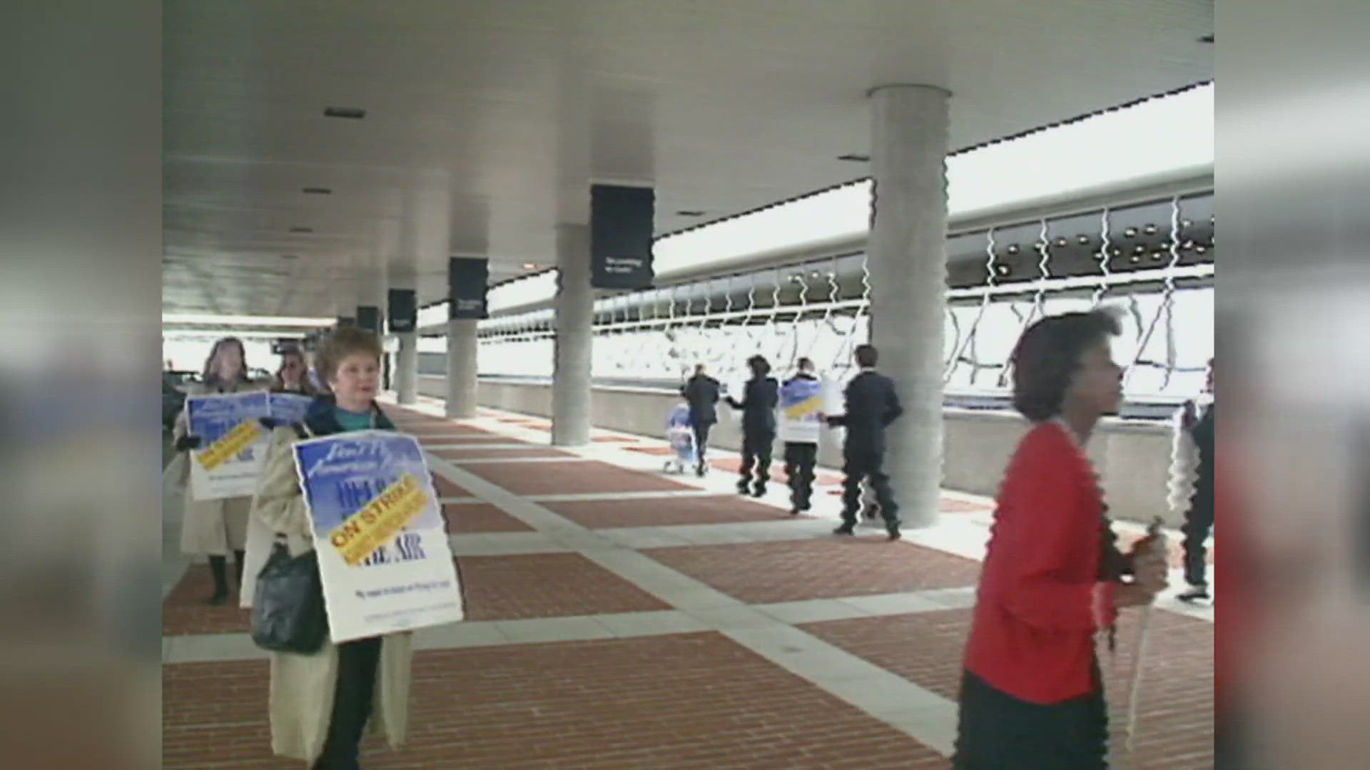 Picketers protested pay and hours.