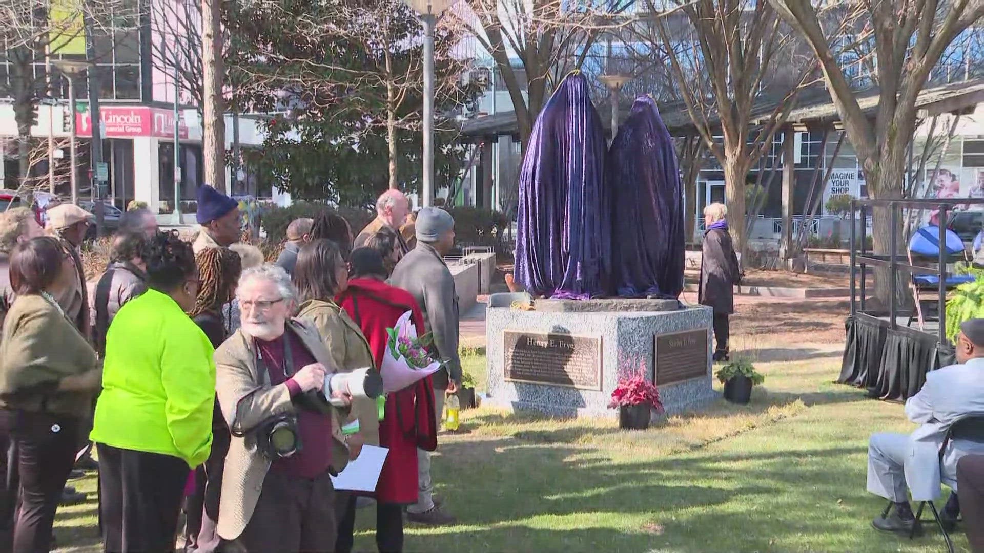 Statue honoring Fryes is unveiled in Center City Park | wfmynews2.com