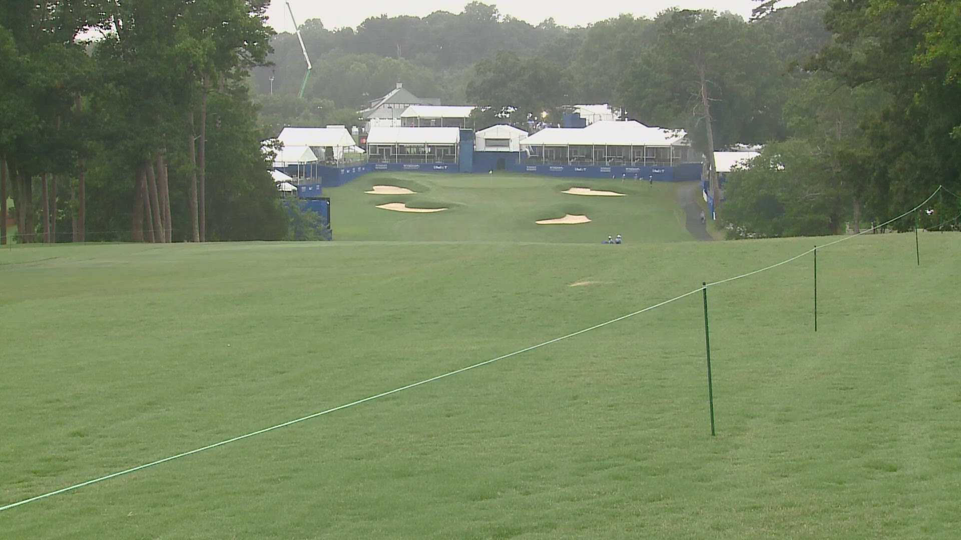 Golfers are prepping to play despite the rain.