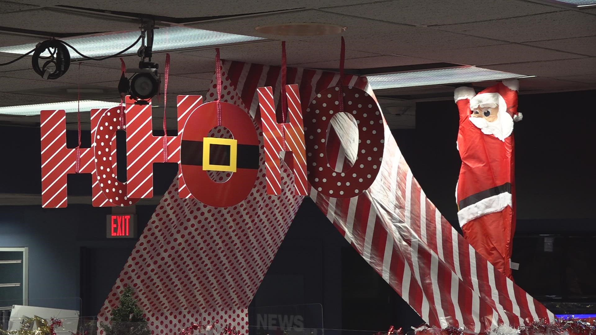 Behind the scenes action WFMY News 2's Holiday desk decorating contest