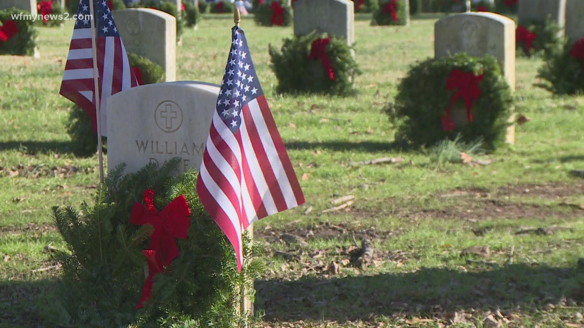 After scaling back the 2020 event, Wreaths Across Greensboro now invites all families to this year's special service to place 1,100 wreaths on veterans' graves.