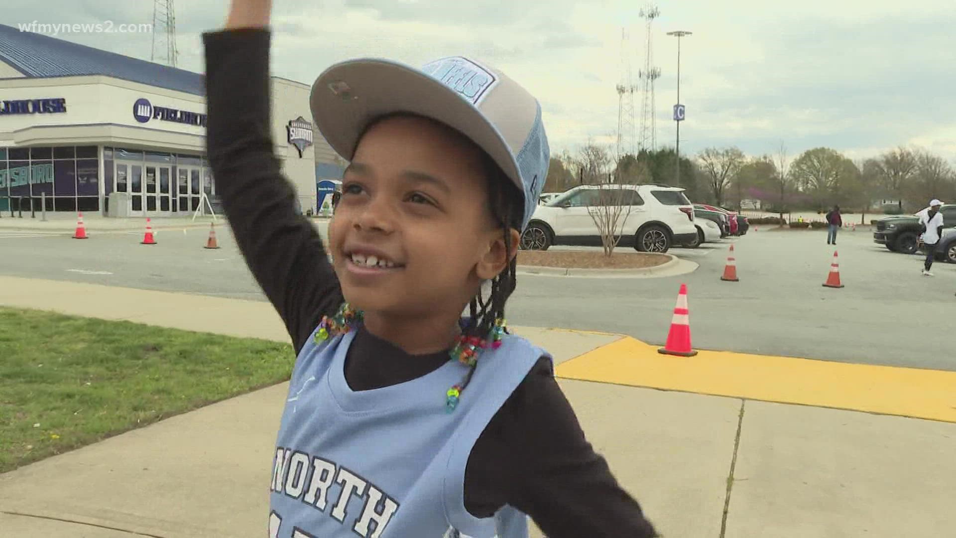 Families traveled to the Gate City to watch the Tar Heels take on South Carolina in the Sweet 16. They also stuck around to watch the men's game on TV.