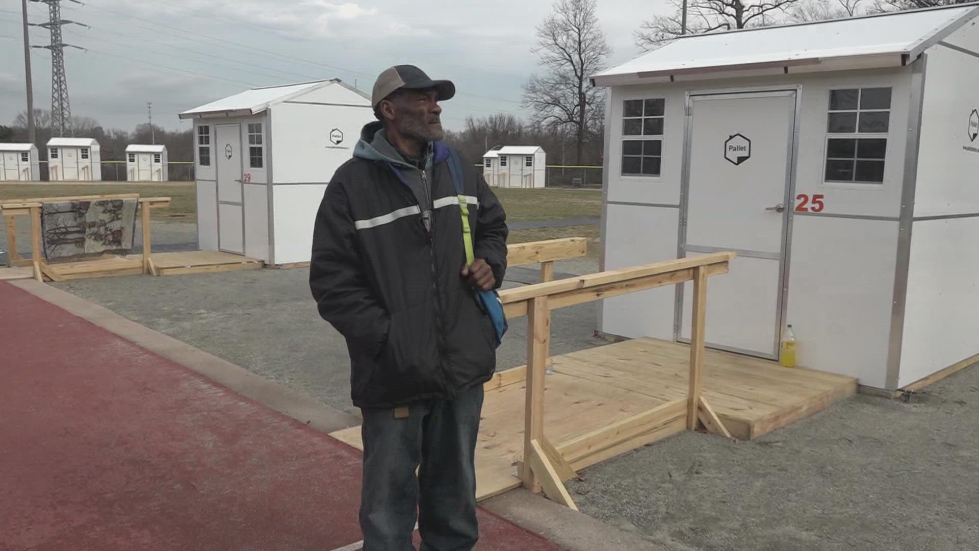 Greensboro man shares experience while staying in pallet homes