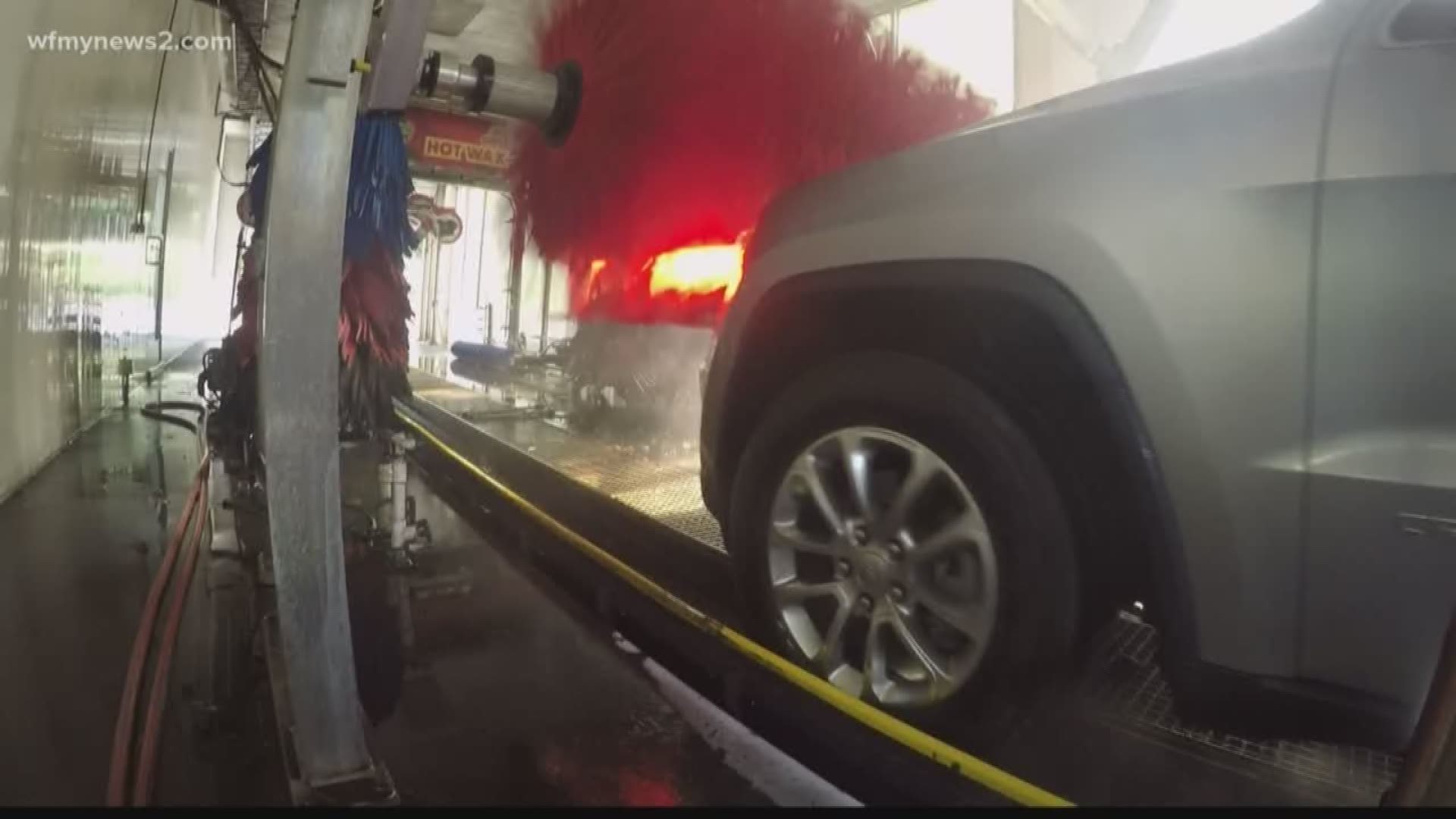 It was supposed to be a normal trip to the car-wash when part of a Greensboro couple's SUV was torn off as it moved through the wash.