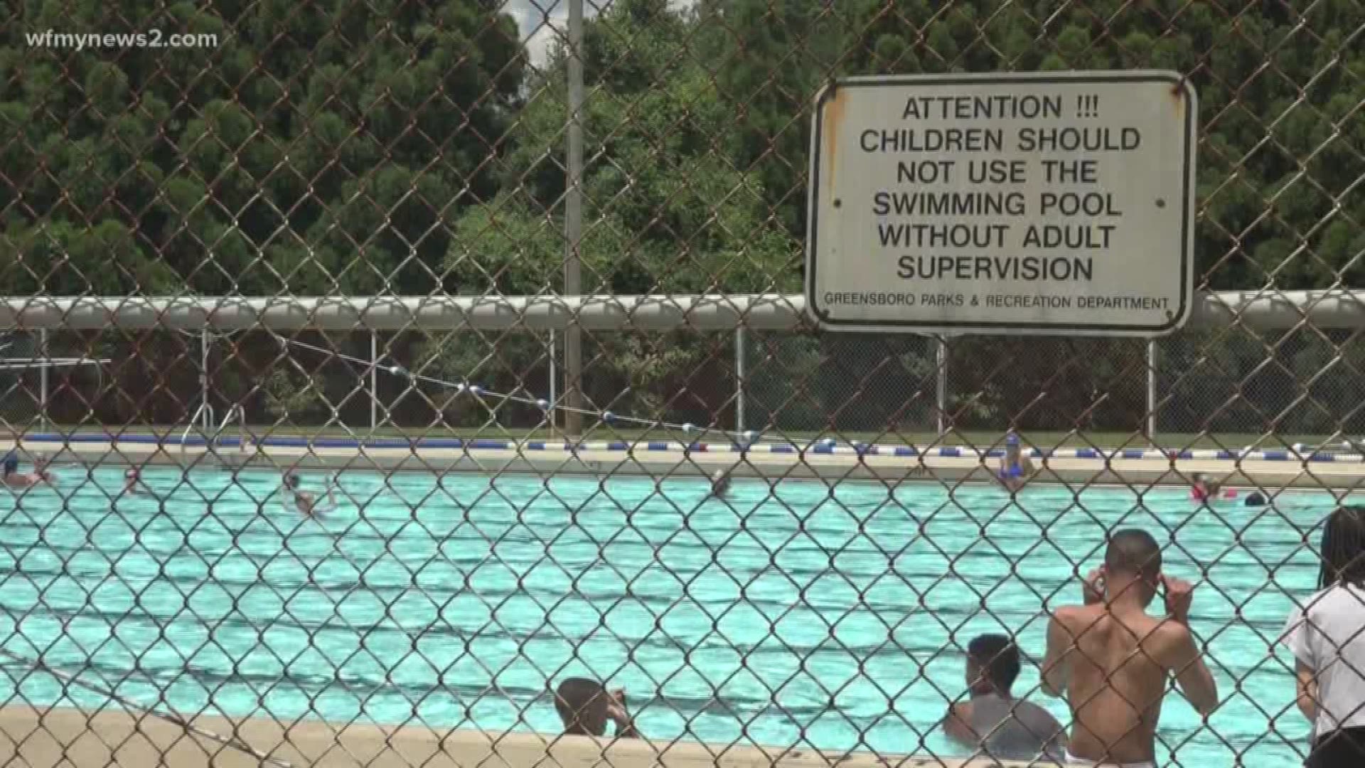 Public health officials are warning people to take precautions and protect themselves against a microscopic parasite which can live for days in swimming pools and water playgrounds.